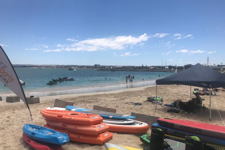 a boat sitting on top of a beach