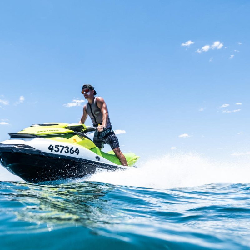a man riding a wave on a surfboard in the water